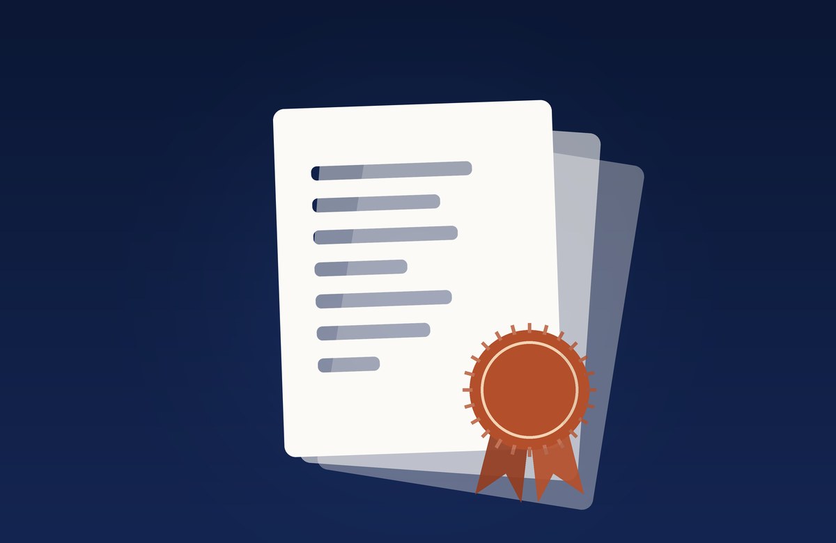 A stack of documents with a wax seal and ribbon